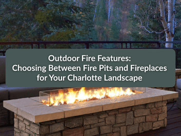 A rectangular stone fire pit with glass sides is on a patio surrounded by outdoor seating, with trees in the background. Text reads: "Outdoor Fire Features: Choosing Between Fire Pits and Fireplaces for Your Charlotte Landscape.