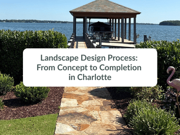 A stone pathway leads to a covered dock on a lake, surrounded by green shrubs, with a pink flamingo lawn ornament on the right. Text overlay reads “Landscape Design Process: From Concept to Completion in Charlotte.”.